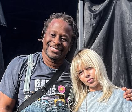 Mola Adebisi ir Adelina Zilai